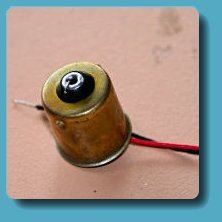 The base with wire ready to solder, red to the center connection black to the side